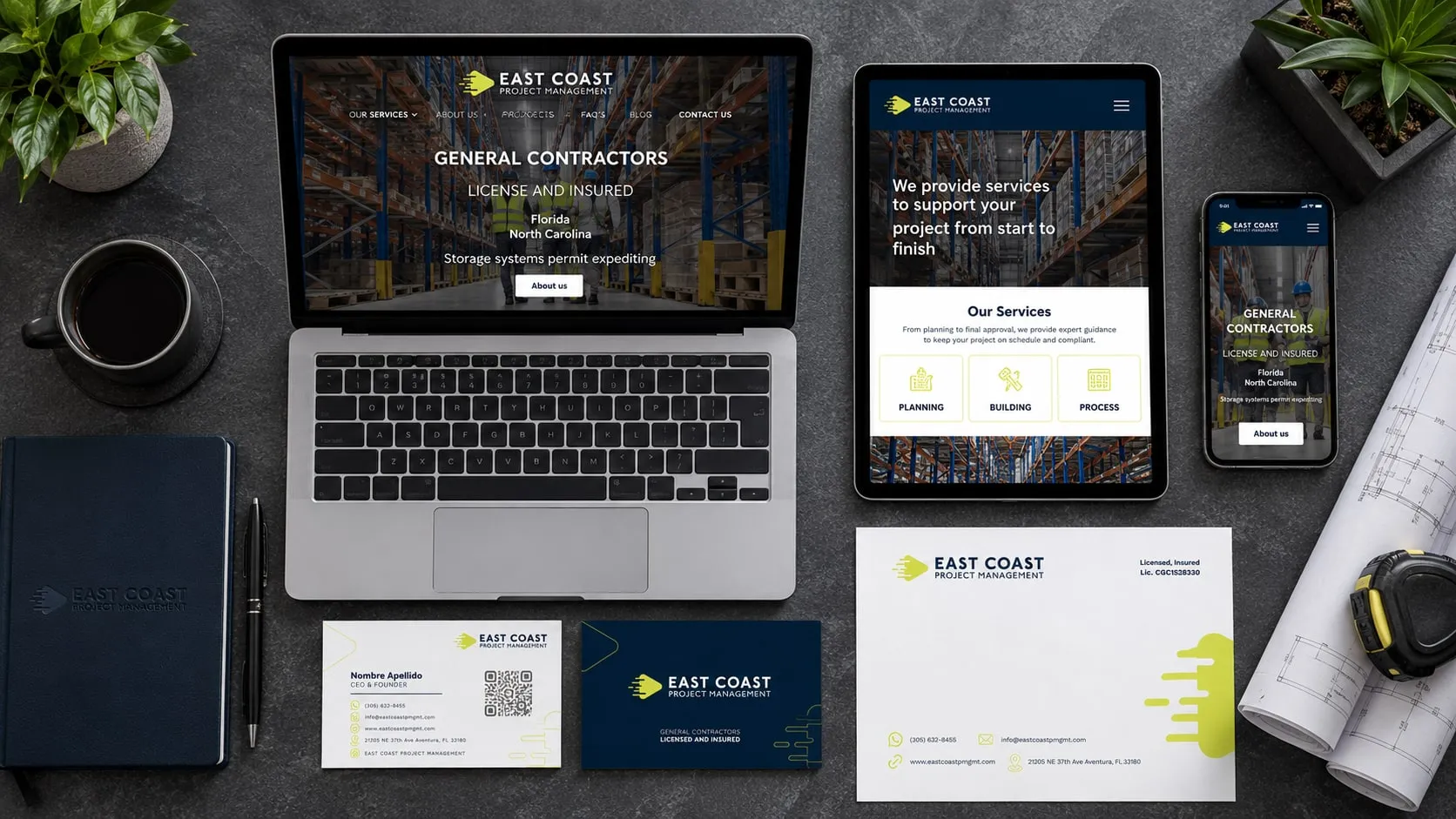 East Coast Project Management website and cards on a work table